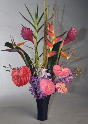 The Tropical Temptation contains Hawaiian Anthurium, Ginger, heliconias ...